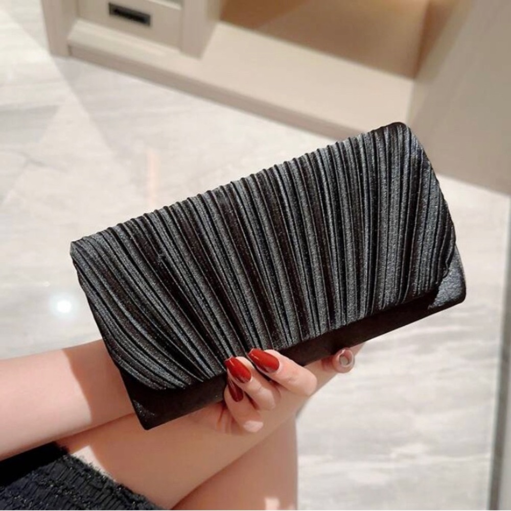 Woman’s shimmery clutch